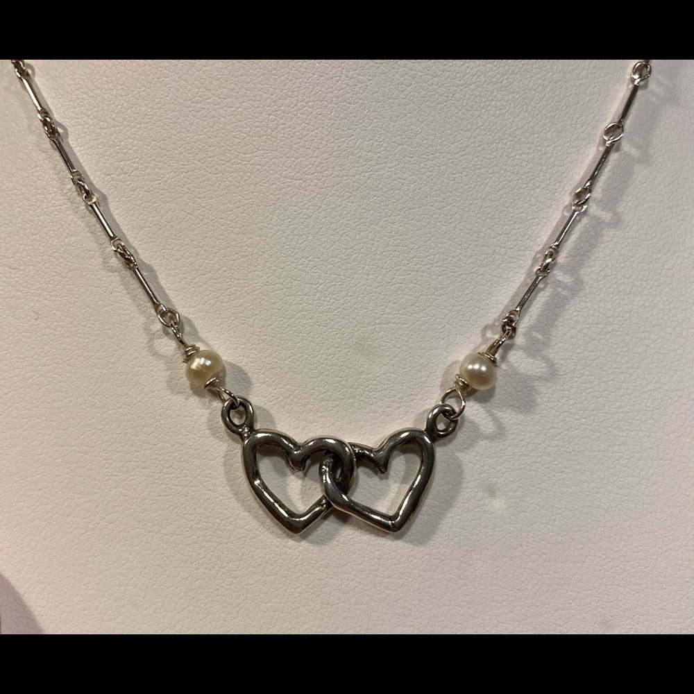 Sterling silver double heart necklace.